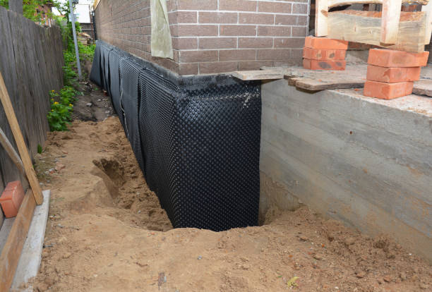 SJ Waterproofing Pros technician performing targeted Exterior Waterproofing assessment in Willoughby, OH